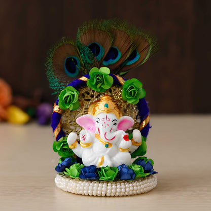 Lord Ganesha Idol on Decorative Handcrafted Floral Plate with Peacock Feather for Home and Car - Decorwala